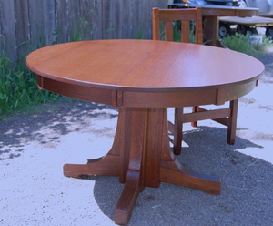Stickley Brothers 48 in dining table with three leaves.  Signed.  Professionally refinished.